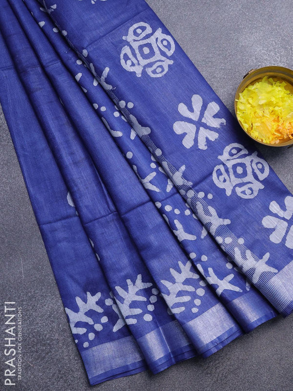 Linen cotton saree blue with allover batik butta prints and silver zari woven border