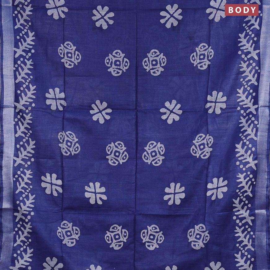 Linen cotton saree blue with allover batik butta prints and silver zari woven border