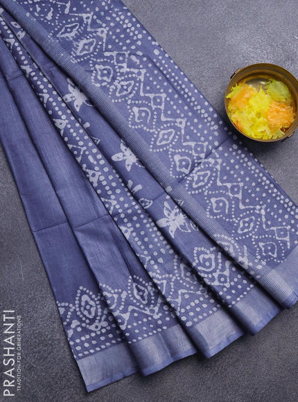 Linen cotton saree grey with allover batik butta prints and silver zari woven border