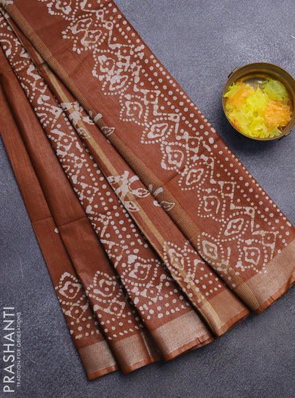 Linen cotton saree brown shade with allover batik butta prints and silver zari woven border