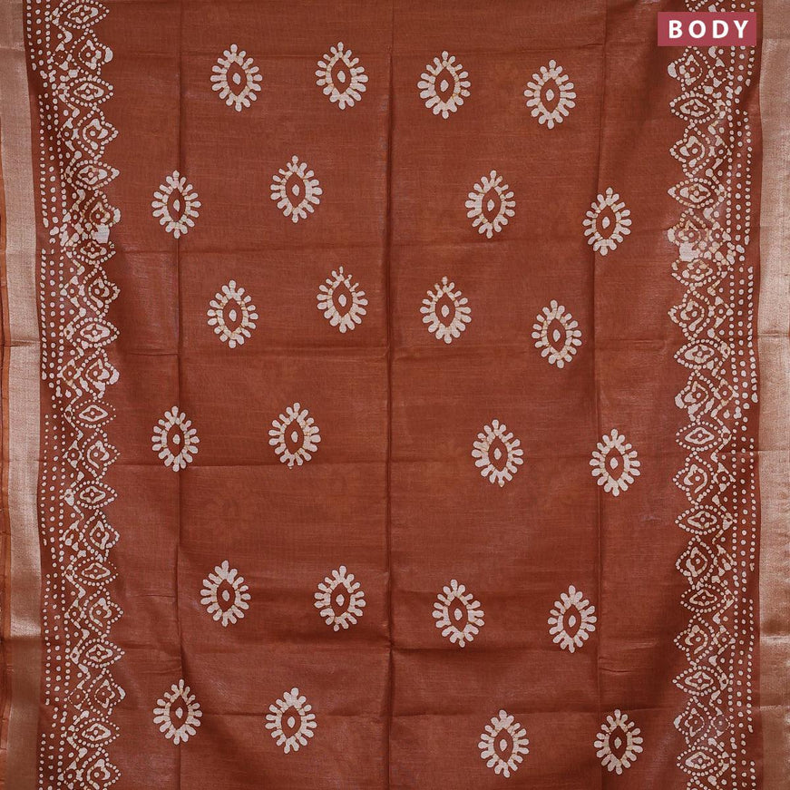 Linen cotton saree brown shade with allover batik butta prints and silver zari woven border