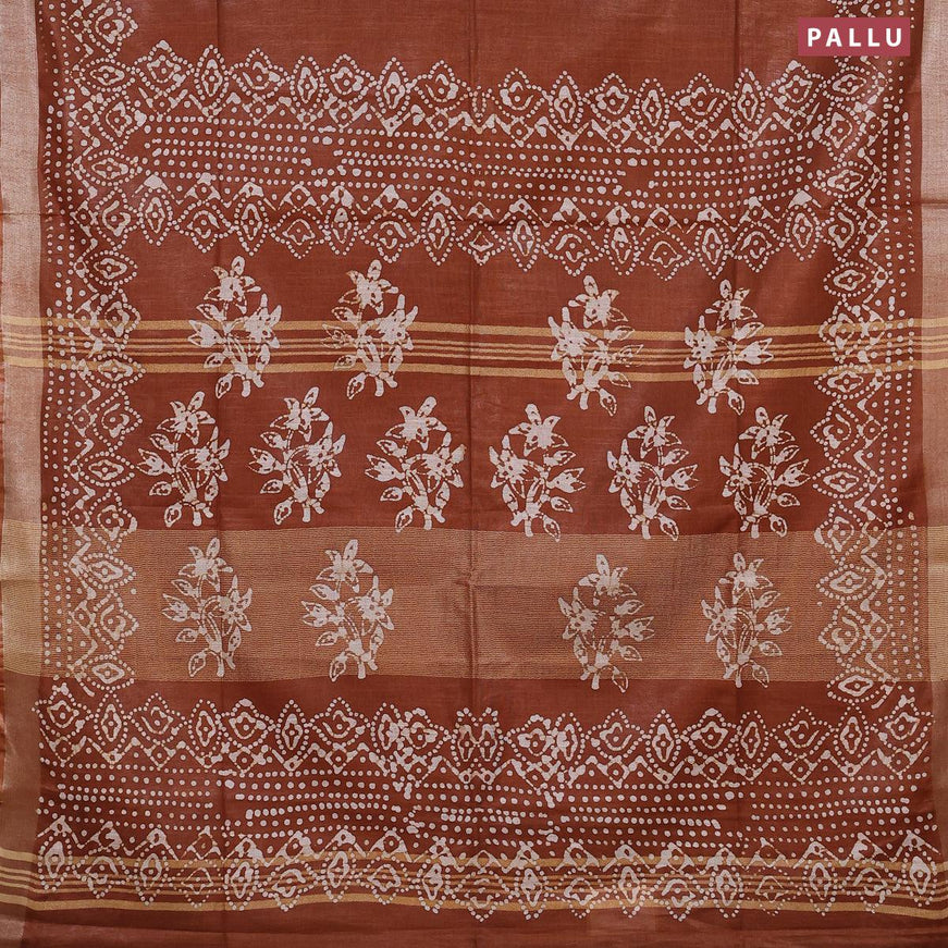 Linen cotton saree brown shade with allover batik butta prints and silver zari woven border