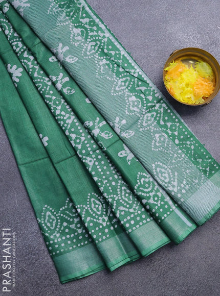 Linen cotton saree green with allover batik butta prints and silver zari woven border