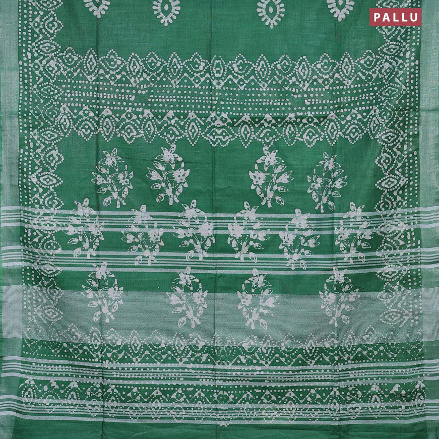 Linen cotton saree green with allover batik butta prints and silver zari woven border