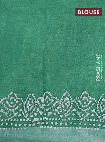 Linen cotton saree green with allover batik butta prints and silver zari woven border