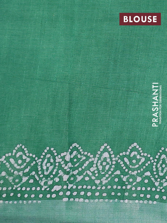 Linen cotton saree green with allover batik butta prints and silver zari woven border