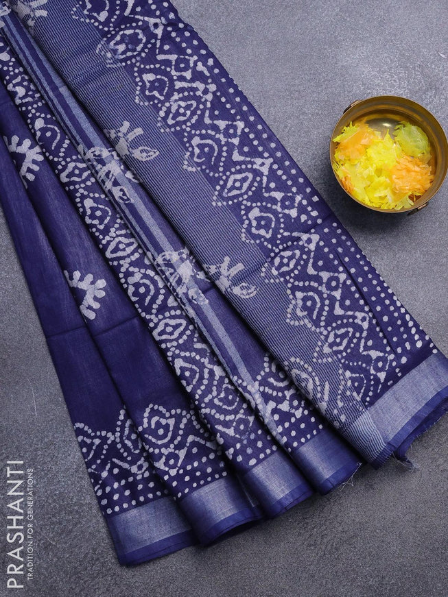 Linen cotton saree navy blue with allover batik butta prints and silver zari woven border