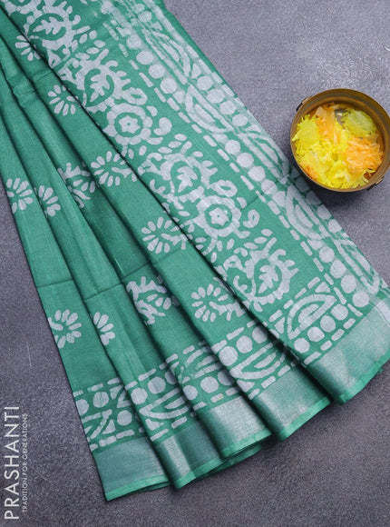 Linen cotton saree green with allover batik butta prints and silver zari woven border