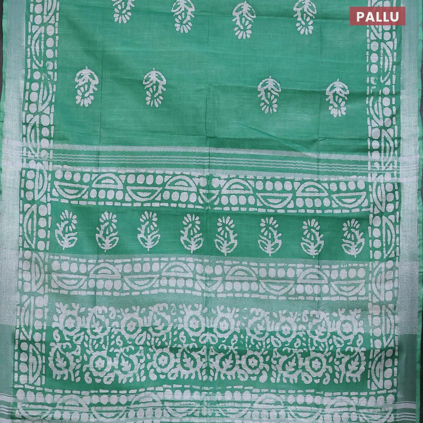 Linen cotton saree green with allover batik butta prints and silver zari woven border