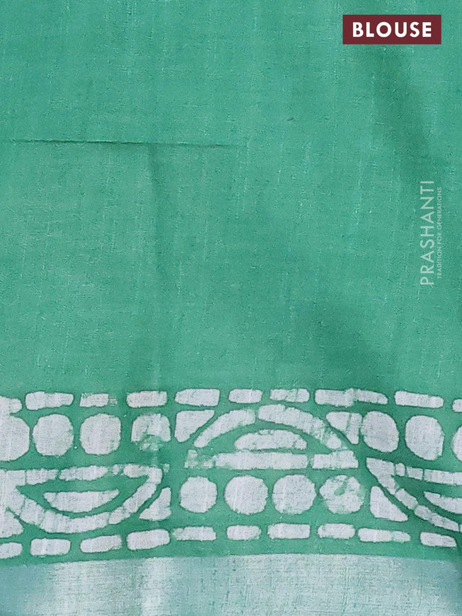 Linen cotton saree green with allover batik butta prints and silver zari woven border