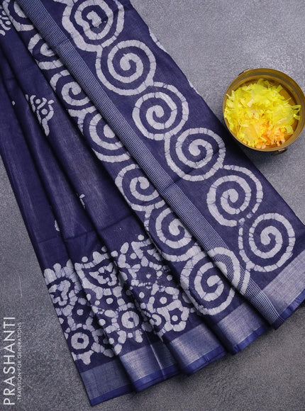 Linen cotton saree navy blue with allover batik butta prints and silver zari woven border