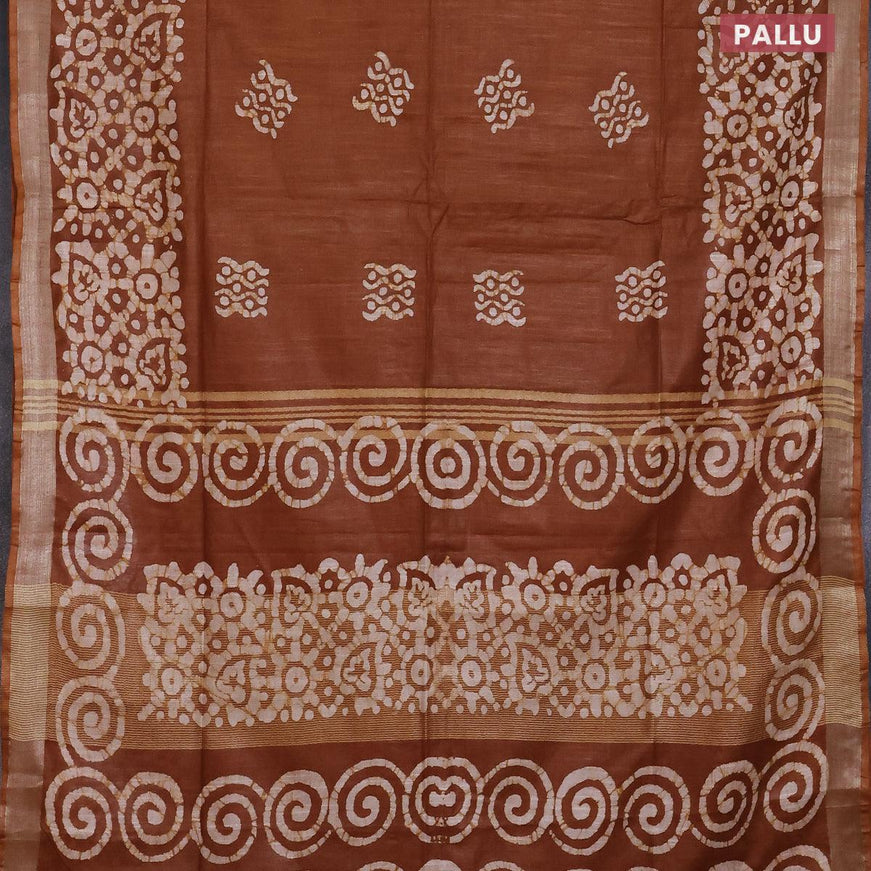 Linen cotton saree brown shade with allover batik butta prints and silver zari woven border