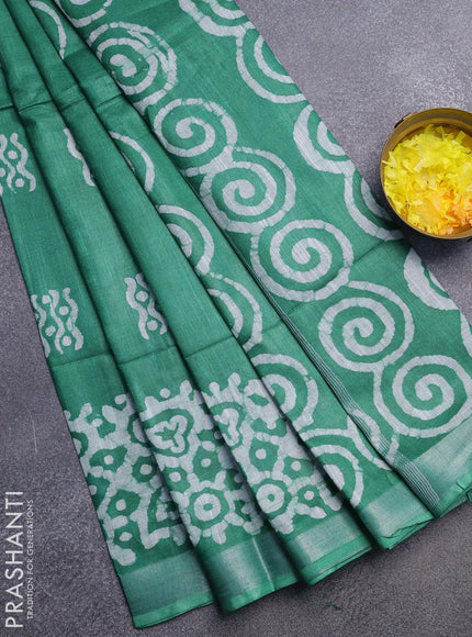 Linen cotton saree green with allover batik butta prints and silver zari woven border