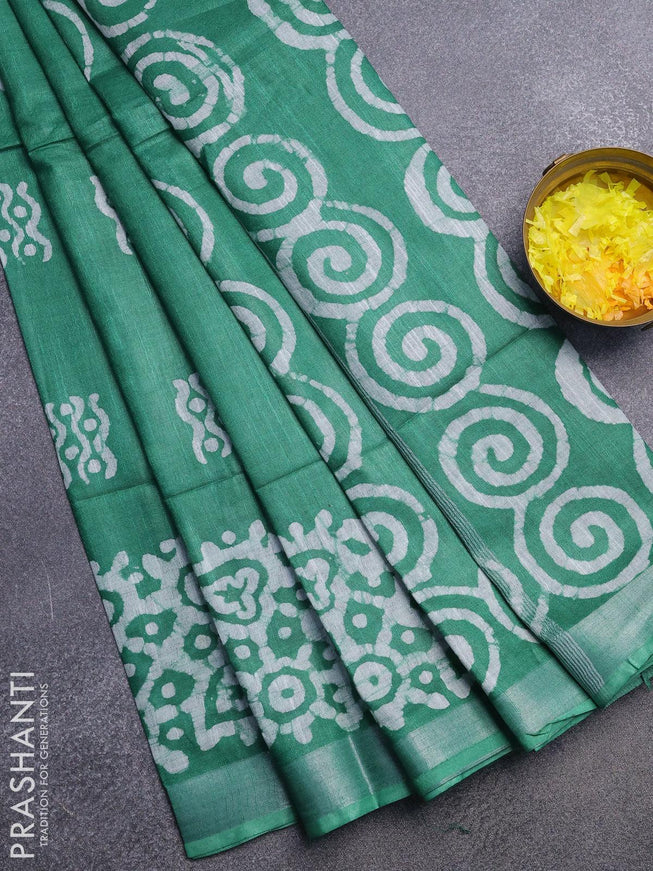 Linen cotton saree green with allover batik butta prints and silver zari woven border