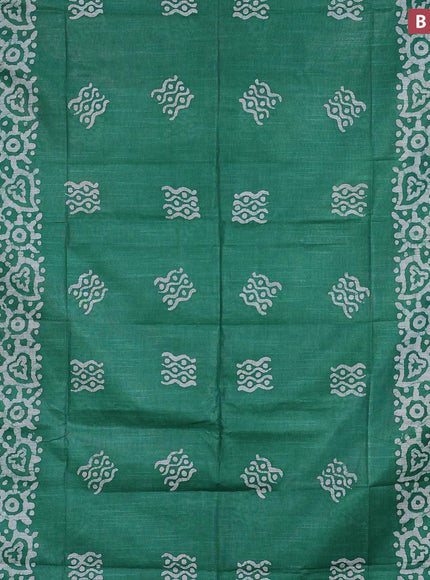 Linen cotton saree green with allover batik butta prints and silver zari woven border