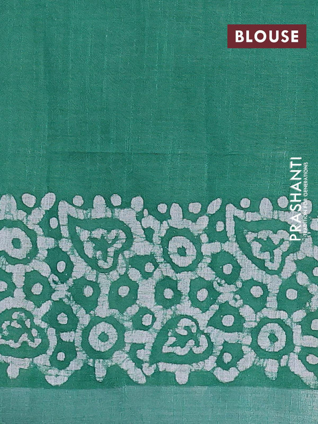 Linen cotton saree green with allover batik butta prints and silver zari woven border