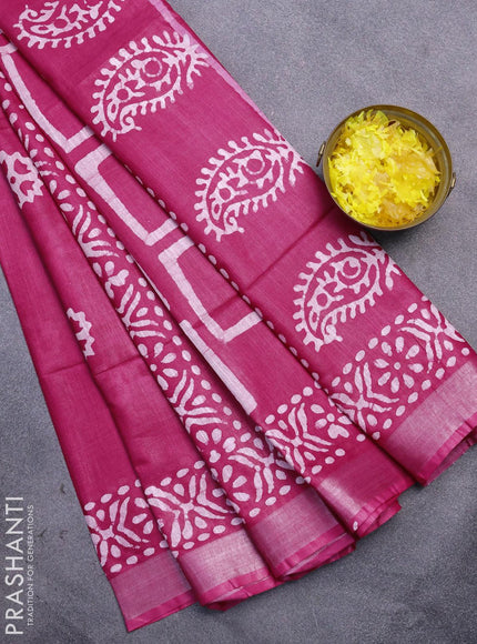 Linen cotton saree pink with allover batik butta prints and silver zari woven border