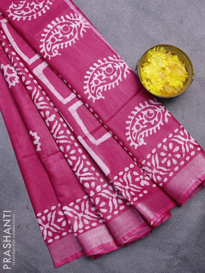 Linen cotton saree pink with allover batik butta prints and silver zari woven border