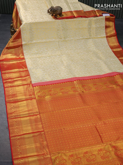 Pure kanjivaram silk saree cream and red with allover floral zari woven brocade weaves and long rich zari woven annam border