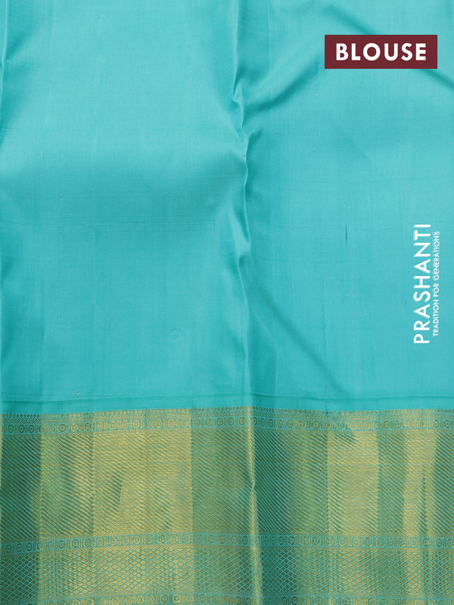 Pure kanjivaram tissue silk saree gold and teal blue with allover rudhraksha zari woven brocade weaves and rich zari woven border