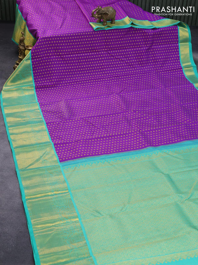 Pure kanjivaram silk saree violet and teal blue with allover zari woven butta weaves and long annam & rudhraksha zari woven border