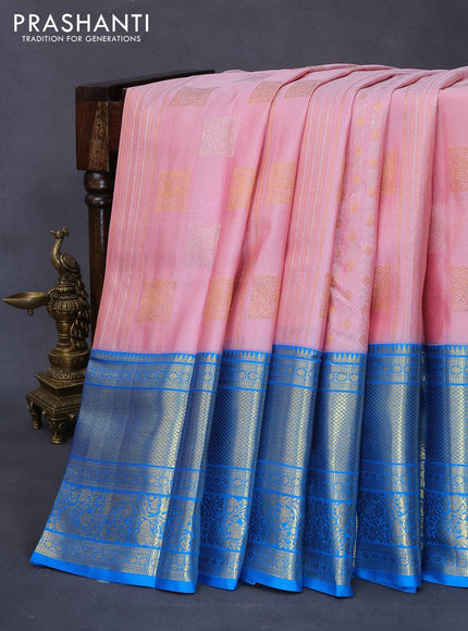 Pure kanjivaram silk saree light pink and cs blue with allover silver & gold zari weaves & buttas and long rich zari woven border