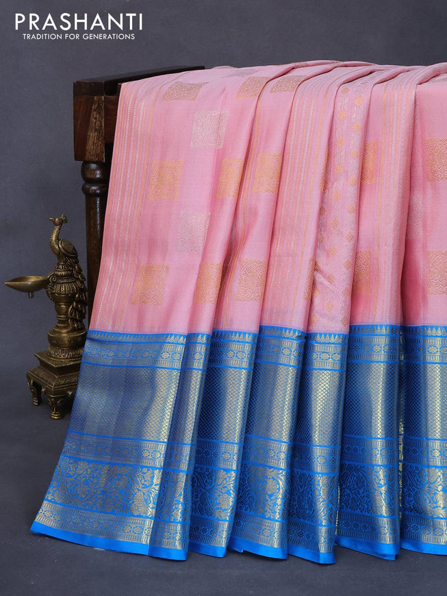 Pure kanjivaram silk saree light pink and cs blue with allover silver & gold zari weaves & buttas and long rich zari woven border