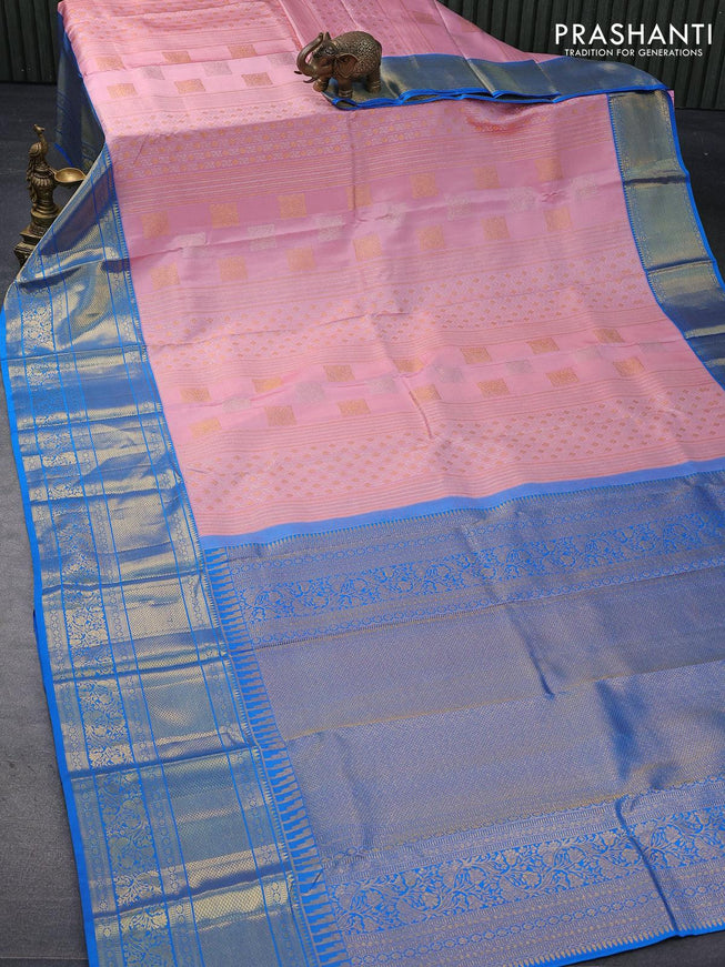 Pure kanjivaram silk saree light pink and cs blue with allover silver & gold zari weaves & buttas and long rich zari woven border