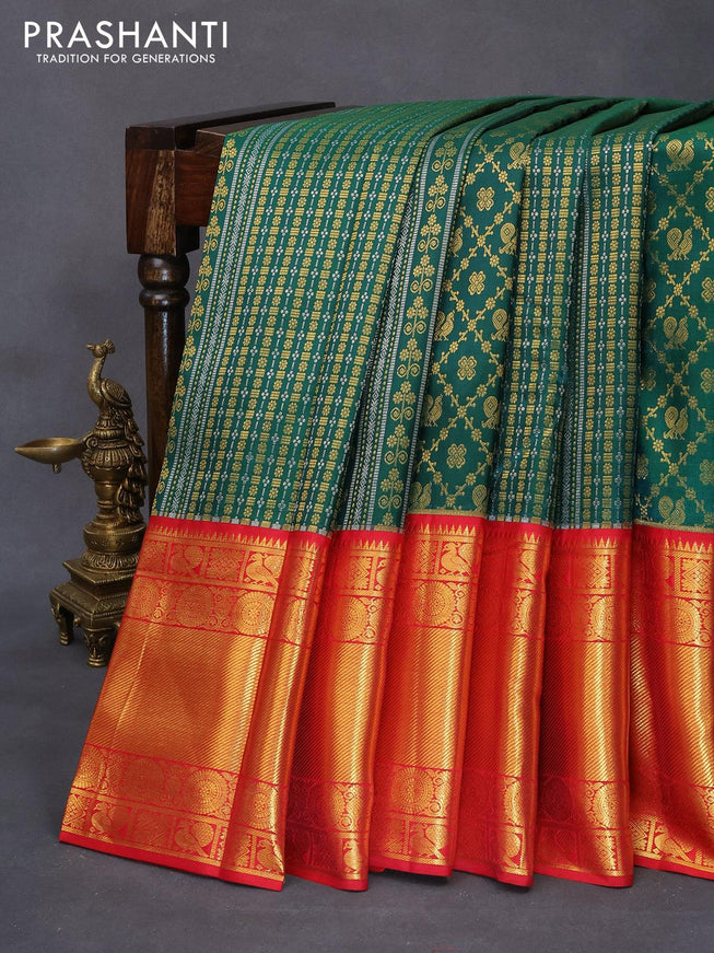 Pure kanjivaram silk saree dark green and red with allover silver & gold zari woven brocade weaves and long rich zari woven border