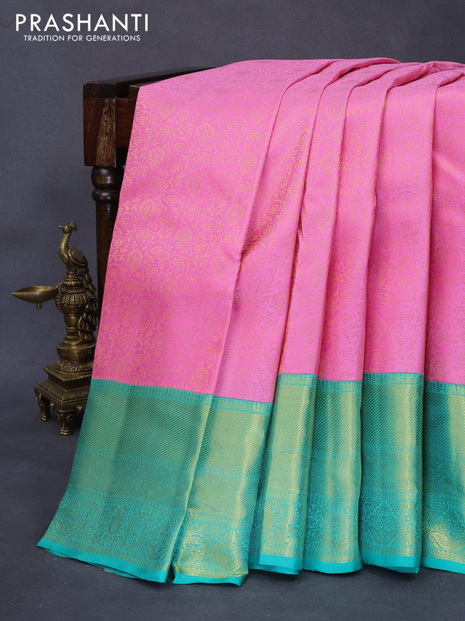 Pure kanjivaram silk saree light pink and teal green with allover zari weaves and long rich zari woven border