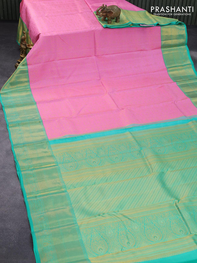 Pure kanjivaram silk saree light pink and teal green with allover zari weaves and long rich zari woven border