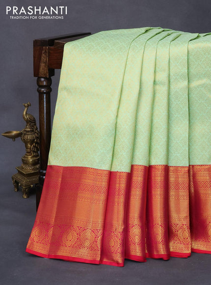 Pure kanjivaram silk saree pista green and pink with allover zari woven brocade weaves and long rich zari woven border