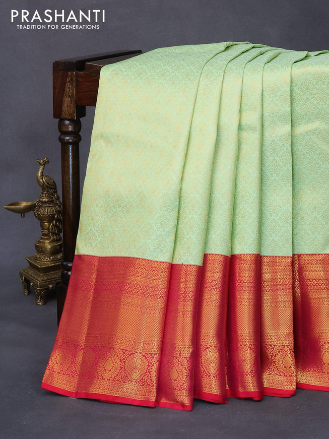 Pure kanjivaram silk saree pista green and pink with allover zari woven brocade weaves and long rich zari woven border