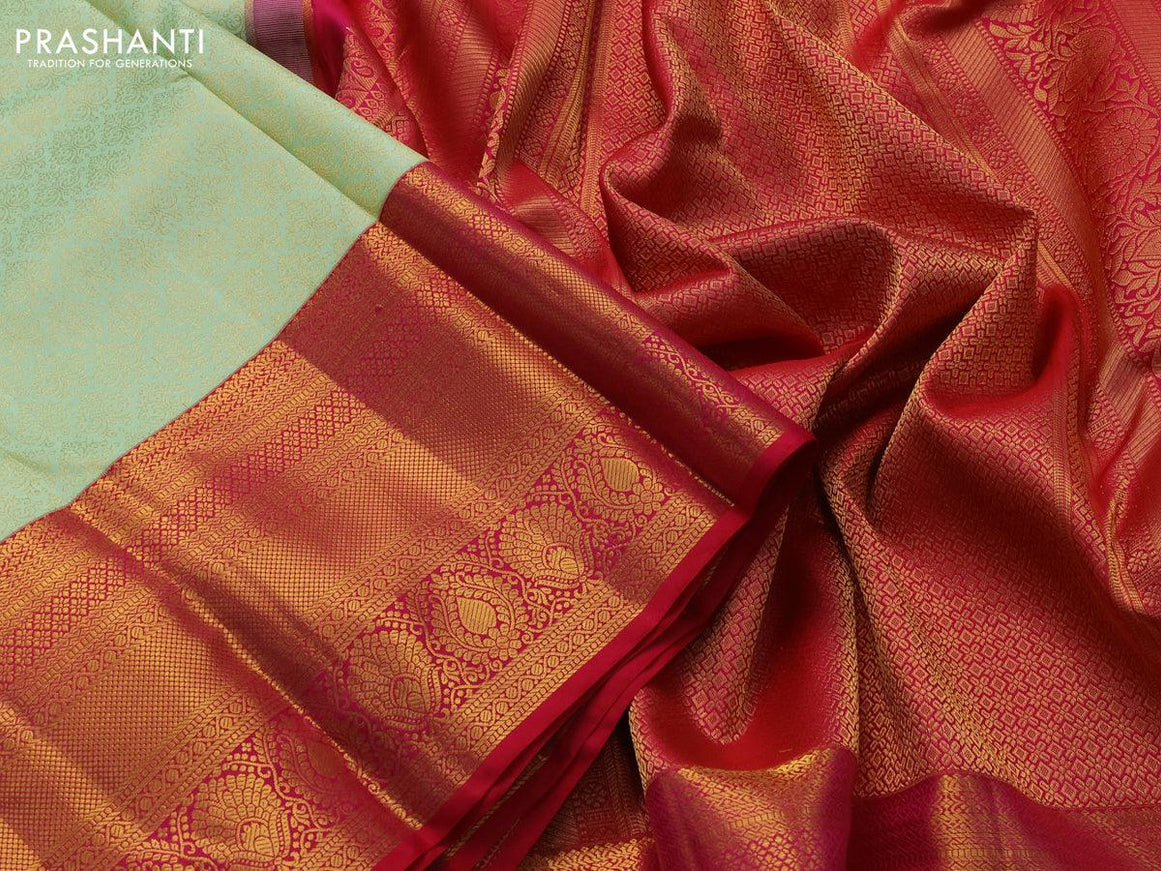 Pure kanjivaram silk saree pista green and pink with allover zari woven brocade weaves and long rich zari woven border