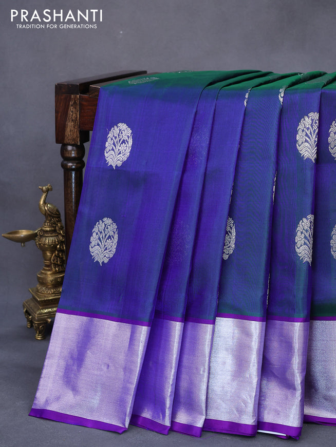 Venkatagiri silk saree dual shade of bluish green and violet with silver zari woven floral buttas and silver zari woven border