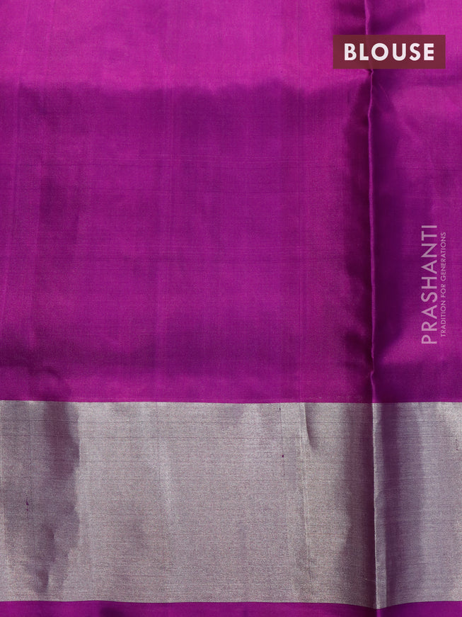 Venkatagiri silk saree dual shade of greenish maroon and purple with silver zari woven buttas and silver zari woven border