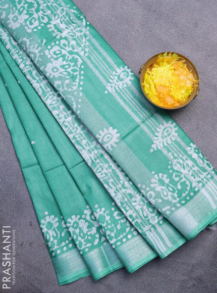 Linen cotton saree green with allover batik butta prints and silver zari woven border