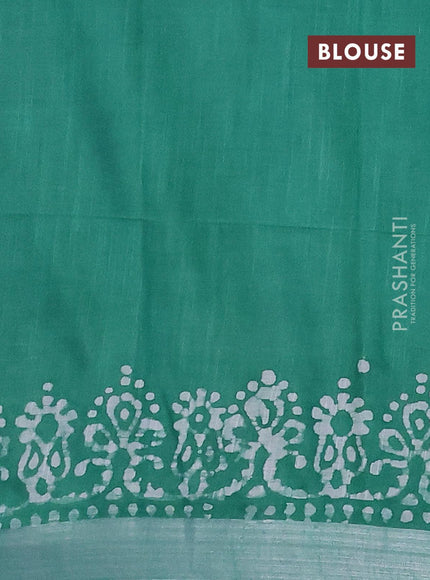 Linen cotton saree green with allover batik butta prints and silver zari woven border