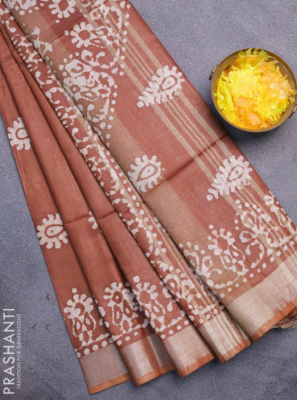 Linen cotton saree brown shade with allover batik butta prints and silver zari woven border