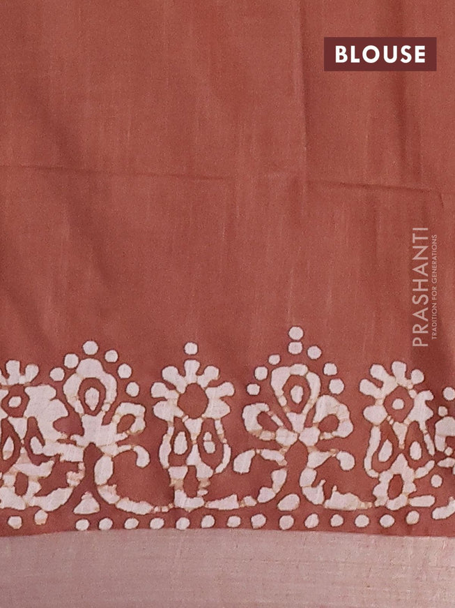 Linen cotton saree brown shade with allover batik butta prints and silver zari woven border