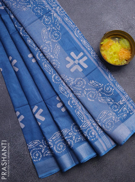 Linen cotton saree cs blue with allover batik butta prints and silver zari woven border