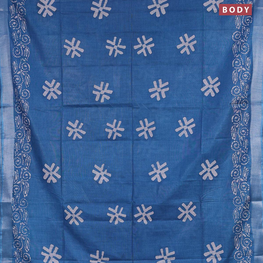 Linen cotton saree cs blue with allover batik butta prints and silver zari woven border