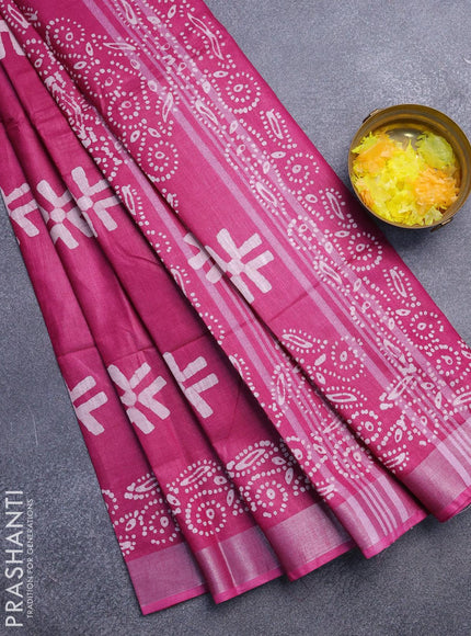 Linen cotton saree magenta pink with allover batik butta prints and silver zari woven border