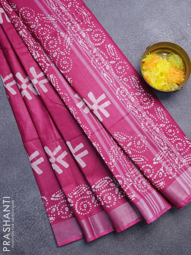 Linen cotton saree magenta pink with allover batik butta prints and silver zari woven border