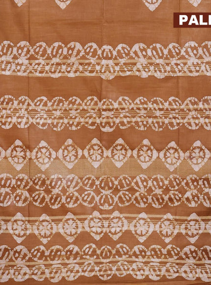 Linen cotton saree brown shade with allover batik butta prints and silver zari woven border