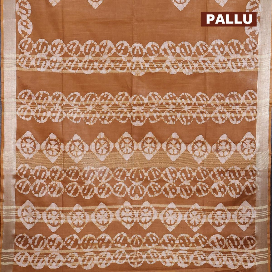 Linen cotton saree brown shade with allover batik butta prints and silver zari woven border