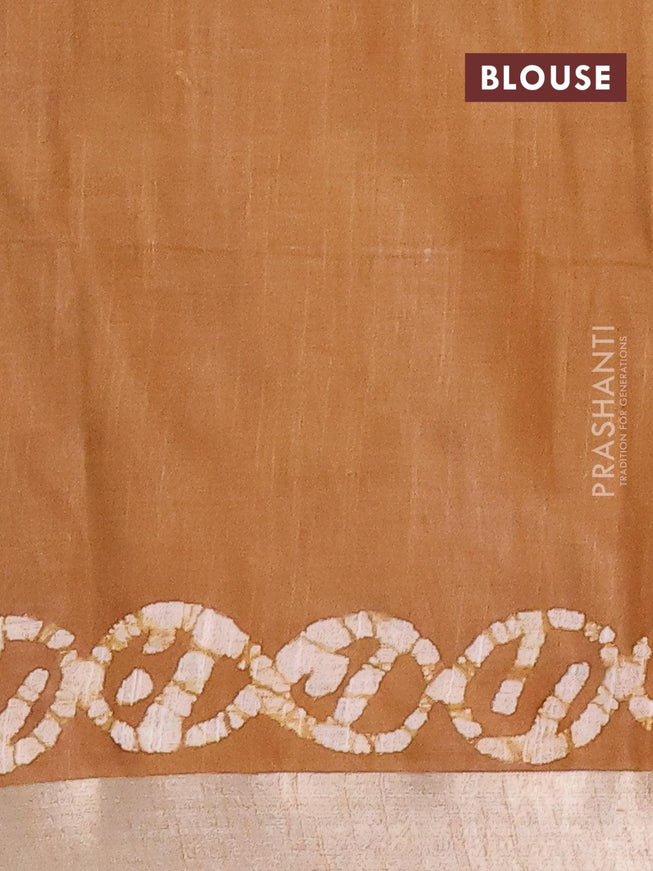 Linen cotton saree brown shade with allover batik butta prints and silver zari woven border