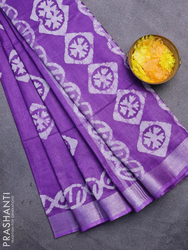 Linen cotton saree lavender shade with allover batik butta prints and silver zari woven border