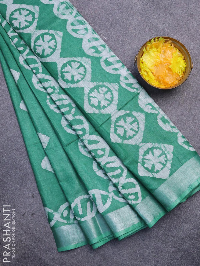 Linen cotton saree green with allover batik butta prints and silver zari woven border