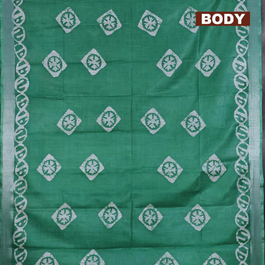 Linen cotton saree green with allover batik butta prints and silver zari woven border